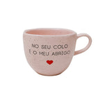 Xícara no seu colo é o meu abrigo