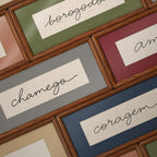Quadro Decorativo Bordado à Mão Chamego 21x41 cm com Paspatur Cinza e Moldura de Madeira